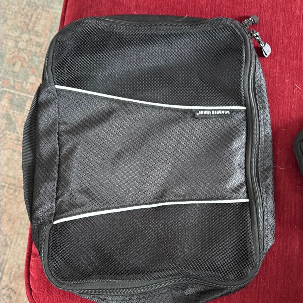 Sharper Image  Black Mesh Packing Bag